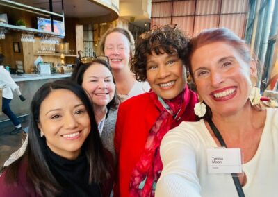 Teresa Moon and four other women pose for a photo at a Parabilis evvent