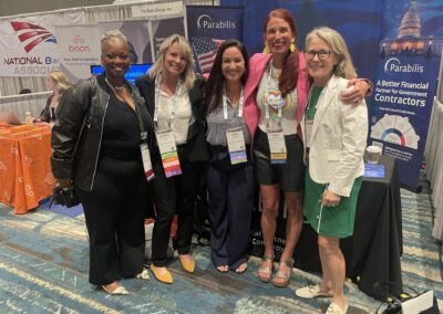 a group of women pose for a photo while at an event for Parabilis